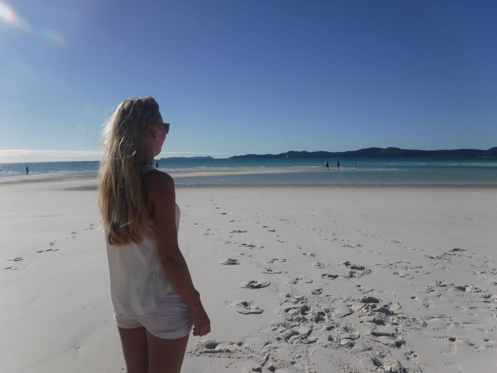 standing on a beach in the whitsundays