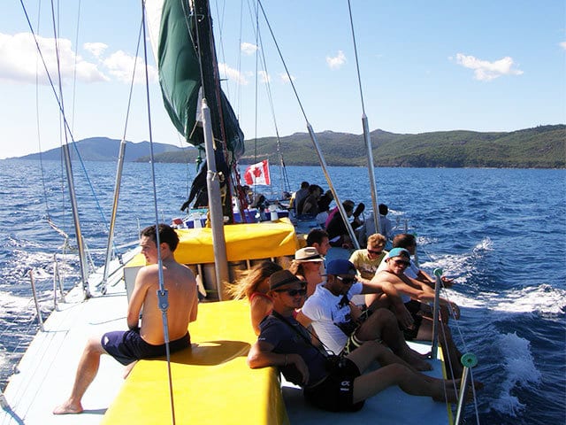 guests resting on deck of apollo 