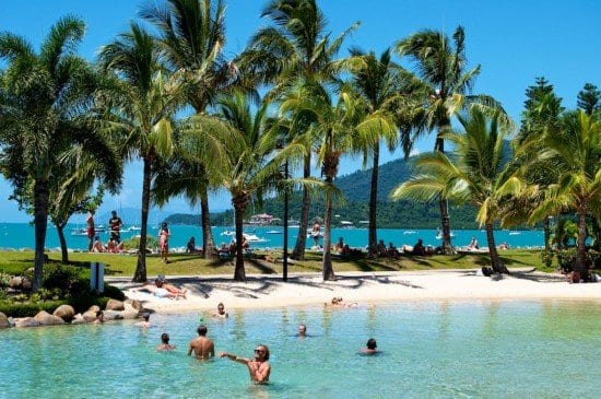 people playing in the Airlie Beach lagoon swimming pool 