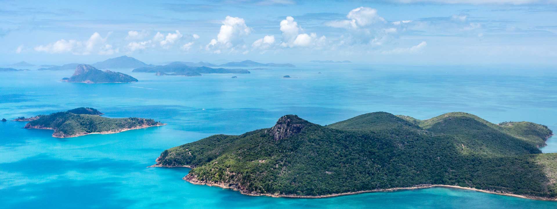 Aerial view of Airlie Beach Weather over the Whitsundays