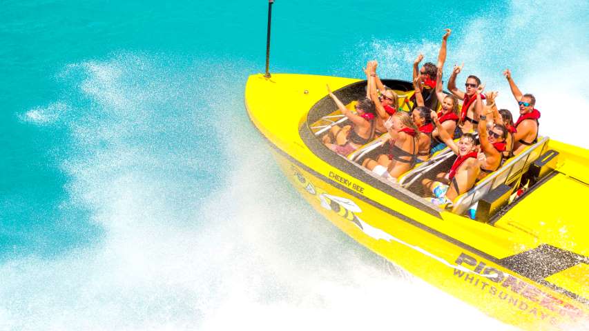 Airlie Beach Jet Boat Tour with guests haveing a fun time