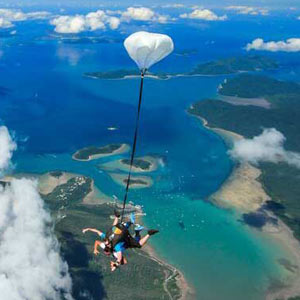 Tandam skydiving free falling over the islands in Queensland